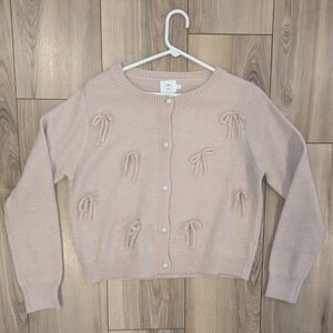 Elegant Bow Accent Cardigan in Soft Beige